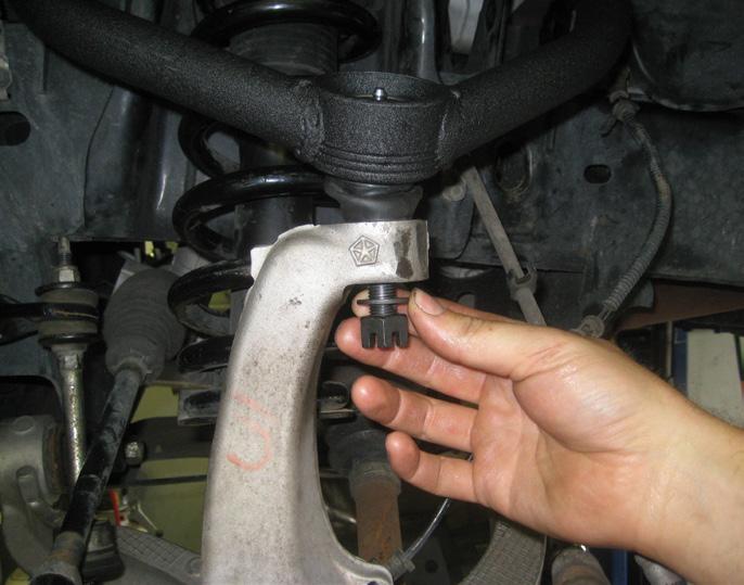Install the bushings and sleeves into each control arm.