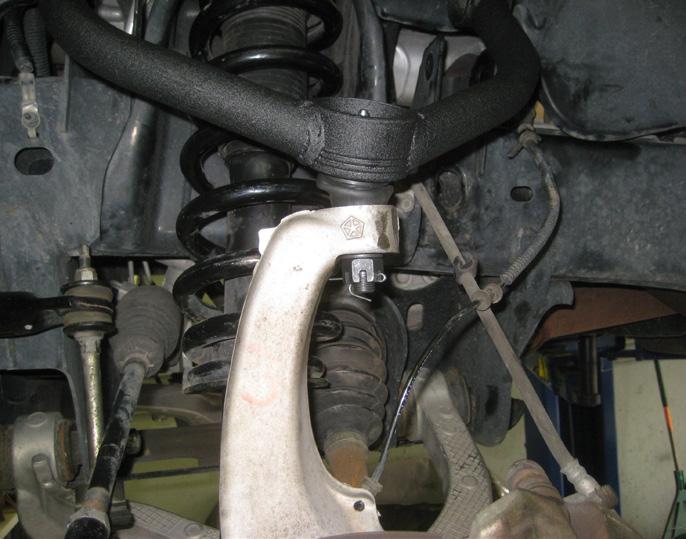 before installing the new bushings and sleeves into the control arms.