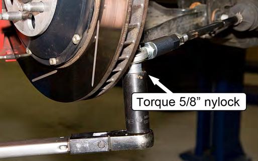 Torque the 5/8 nylock nut to 65 ft-lbs.