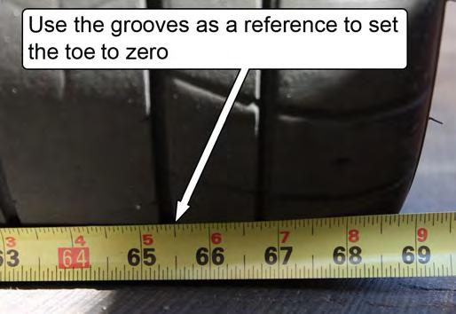 With the vehicle resting at ride height, set the toe as close to zero as possible. This can be adequately done using a tape measure.