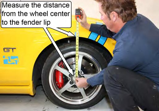 Equally adjust the length of the driver and passenger side tie-rods to make the distance between the front and rear faces of both tires equal. 2.