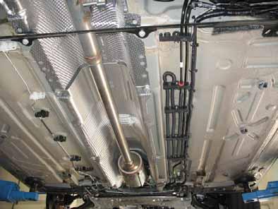 Route fuel line and wiring harness of metering pump in the engine compartment in 0mm dia., 00mm long corrugated tube.