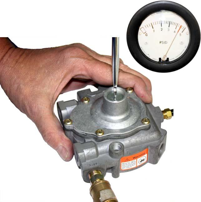 * SLOWLY turn on air pressure to 90-100 psi (621-689kPa) and using a screwdriver, adjust the spring retainer (6) until the primary pressure is between 4 and 5 psi (27.6-34.