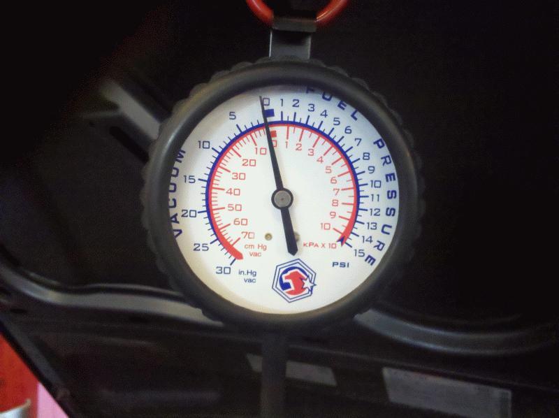 Crank case pressure vacuum gauge An image of a vacuum gauge tied into the crank case via the oil dipstick.
