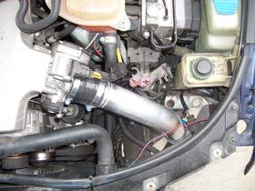 21) If you re-use the stock power-steering cooler, you can carefully bend it over your leg to give it a curve.