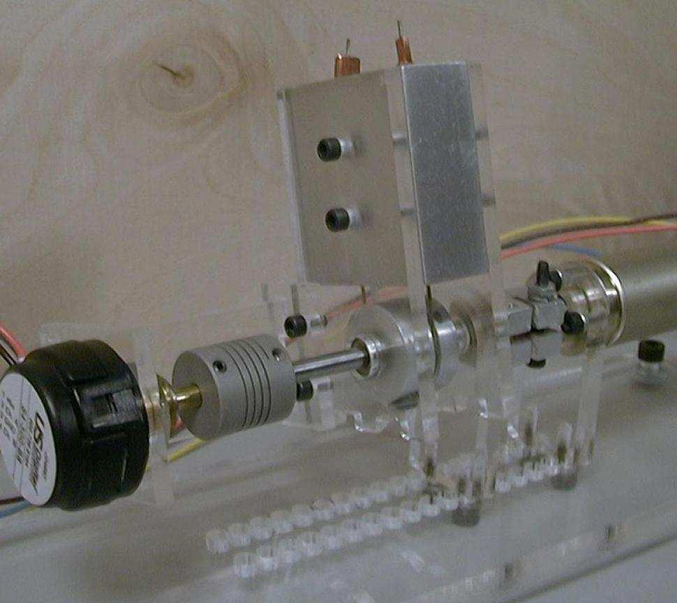 2R Locking Force L - Xi + X L - Xi - X F2 Figure 5: Actuator configuration with applied force holding it in place. Figure 7: A testing prototype of the actuator made of acrylic and aluminum.