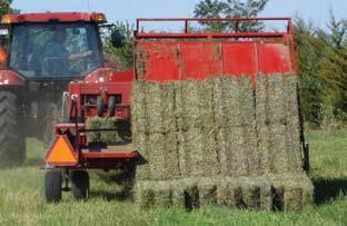 - One-Person Haying Operation - 2 x 4 Tubular Steel Construction - Spiked Steel Roller Powered By Hydraulic Motor - 4 Rows of 3 Bales or 4 Rows of 2 Bales As the baler ejects each bale, they are