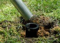 in diameter with a shovel or post hole digger. Test fit the ground sleeve into the hole and continue digging until the collar clamp on the ground sleeve is just above ground level. c. Prepare concrete b.