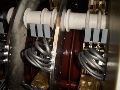 brush-lifting and slip ring short-circuiting gear, first short-circuits the rotor winding