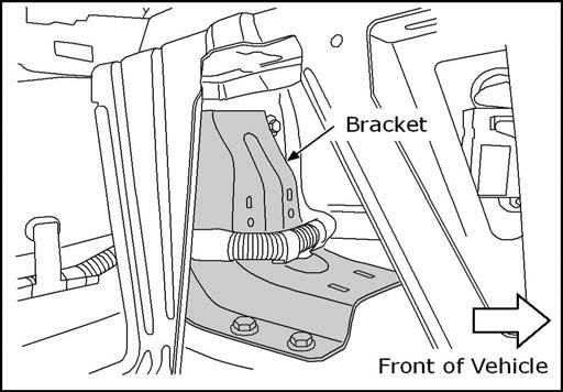12. INSTALLATION Fig. 13 13. Locate the bracket along the inside rear of the driver side compartment.