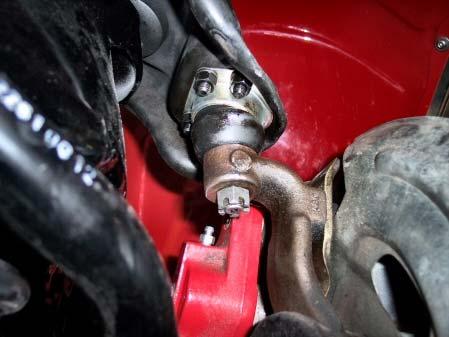 ball-joint stud from the spindle.