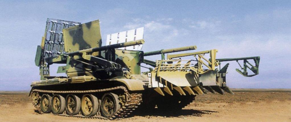 A Chinese GCZ110 Tracked Multipurpose Engineer Vehicle is shown here with its crane traversed to the rear and its dozer blade deployed.