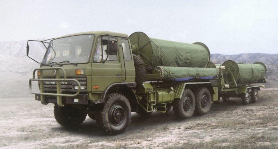 A Light Companying Bridge in travelling configuration on a Mercedes-Benz 6 6 truck.