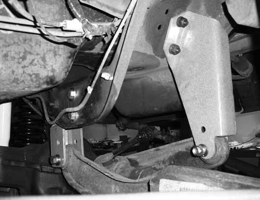 Install OE radius arms with OE bushings and hardware at this time, snug but do not tighten at this time. 22. Support the front axle with a hydraulic jack.