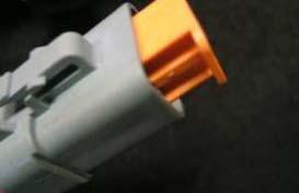 Figure 5 4: Blue 14 AWG ignition input of the main harness. 1 2 4 3 Figure 7 Step 8: Once both wires are inserted into the connector the orange lock can be inserted.