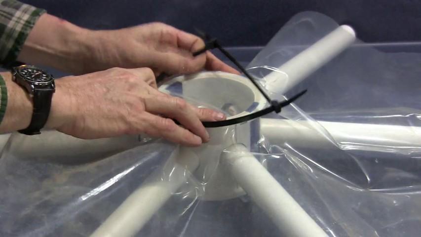 It is easier to attach two layers to the dome if you start with the covering on