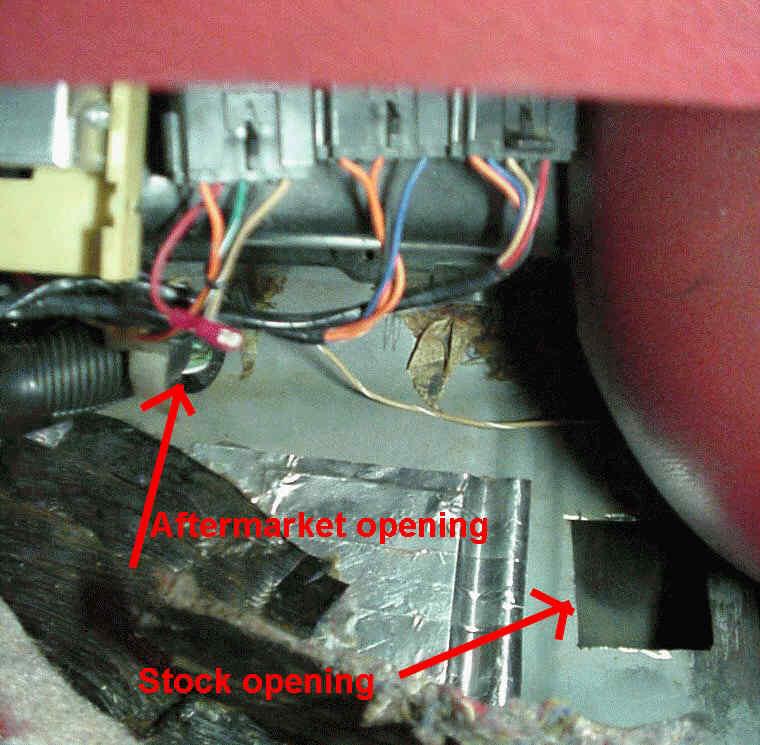 The main trunk of the harness that the distributor and injector harnesses come off lies against the backside of the firewall.