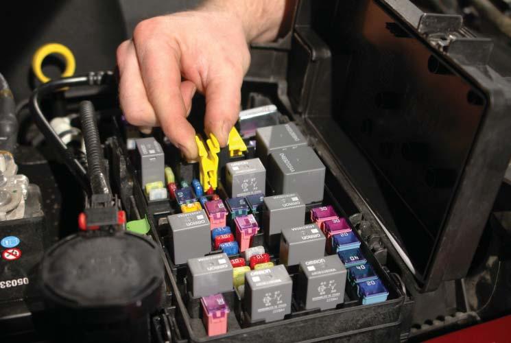 3. Locate the fuse box in the engine bay 4.