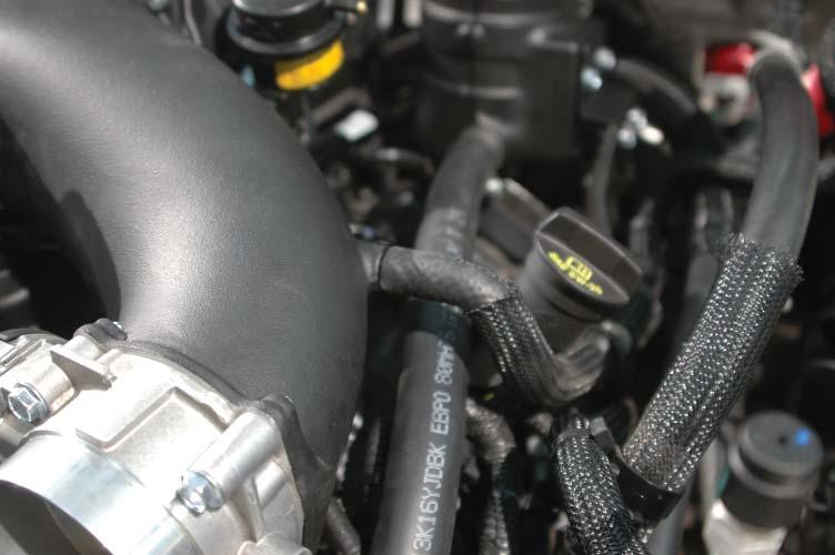 Connect the brake booster hose to the left hand side hose barb on the
