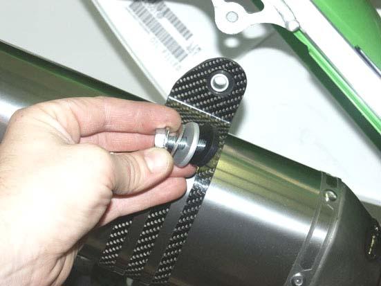 Correctly position the muffler and slide it onto the header tube (Figure 18).