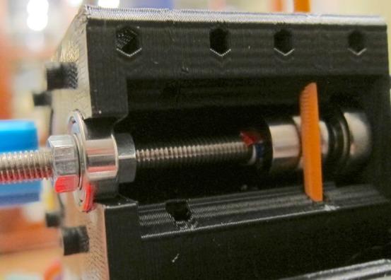 Step 64: Extruder Drive Shaft We want it to be: M5 Nut -> Bearing -> M5 Nut >