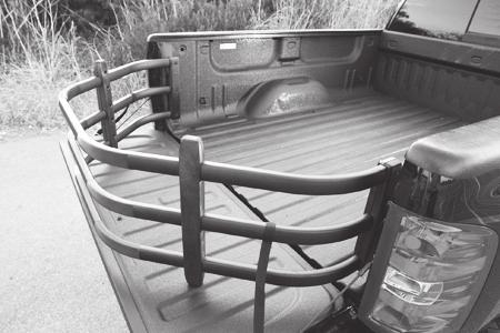 .. BEDXTENDER HD OPERATION With the tailgate open, place BEDXTENDER pivot pins into the