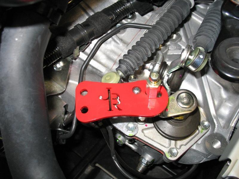 9. Place the Short Shift plate in position as shown below.