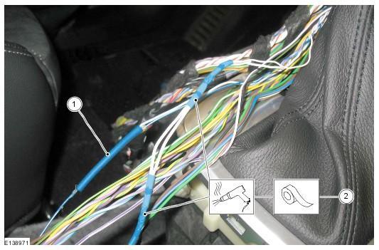 CAN bus wiring harness splice isolated by special heat shrink tubing. Insert the twisted ends of the wires into the solder/heat shrink connector. CAUTION: Do NOT damage any surrounding wiring. 2.