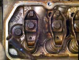 The head and rocker arms were very clean and free of heavy deposits. Note that you can still see the honeycomb stamping and manufacturer s part number.