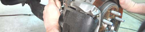 wrench, remove brake caliper as