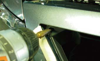 Use the drill bit to connect the holes, making small slots allowing for slight left to right grille adjustments.