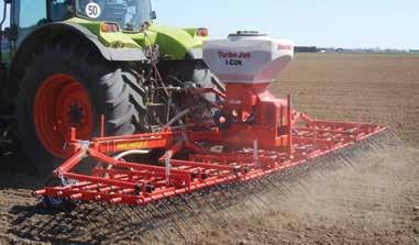 The spreaders may be attached equi-distant across the width in front of or behind following depth control rolls or press rings or wheels or positioned in line with sub-soiler or