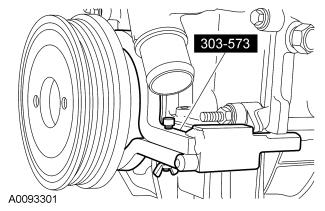 86. Turn the crankshaft one revolution clockwise. 87. NOTICE: Do not rotate the engine counterclockwise. Rotating the engine counterclockwise will result in incorrect timing of the engine.