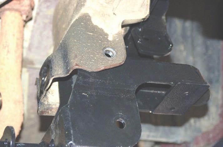 Place the passengers side upper control arm drop bracket from 1274 Box 1, into the stock upper control arm bracket.