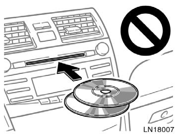 YOUR COMPACT DISC PLAYER WITH CHANGER (type 2) When you insert a disc, push the LOAD button and gently push the disc in with the label side up. This compact disc player can store up to six discs.