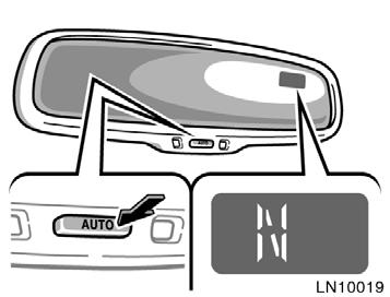 When the instrument panel lights are turned on, the brightness of the time indicator will be reduced. The direction is indicated on the inside rear view mirror.