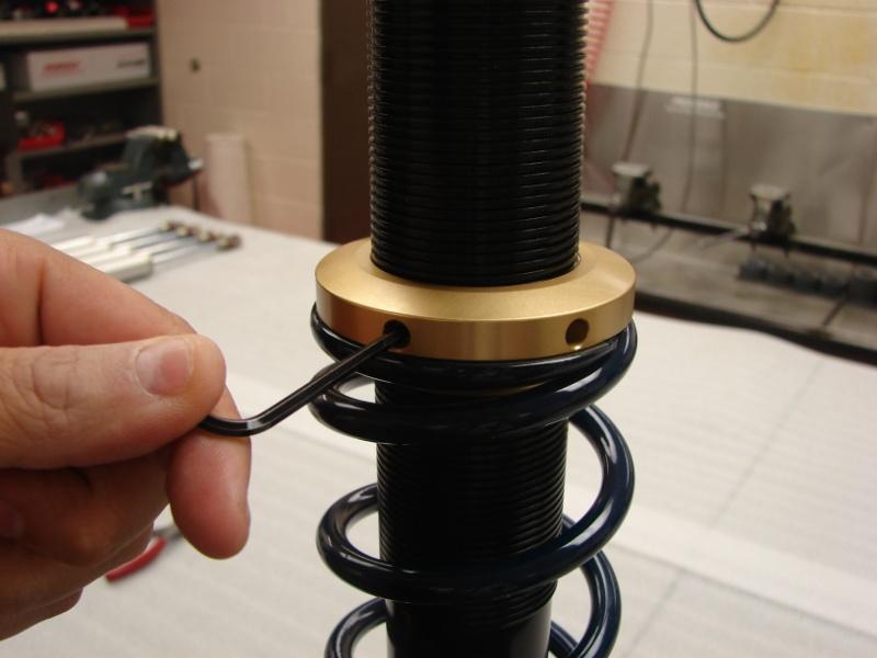 To Set Ride Height: Penske Racing Shocks does not set the spring preload on shocks that include coil over springs. You must set your ride height AFTER installing the shocks on the car.