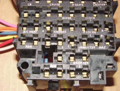 Photo 4: The fuse box is a boltin unit, unlike other kits.