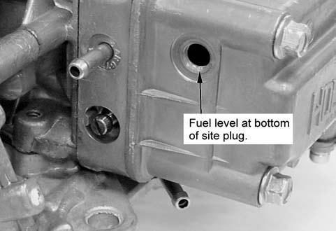 becoming lodged between the fuel inlet needle and its seat. This can result in a fire if a spark is present or a backfire occurs.