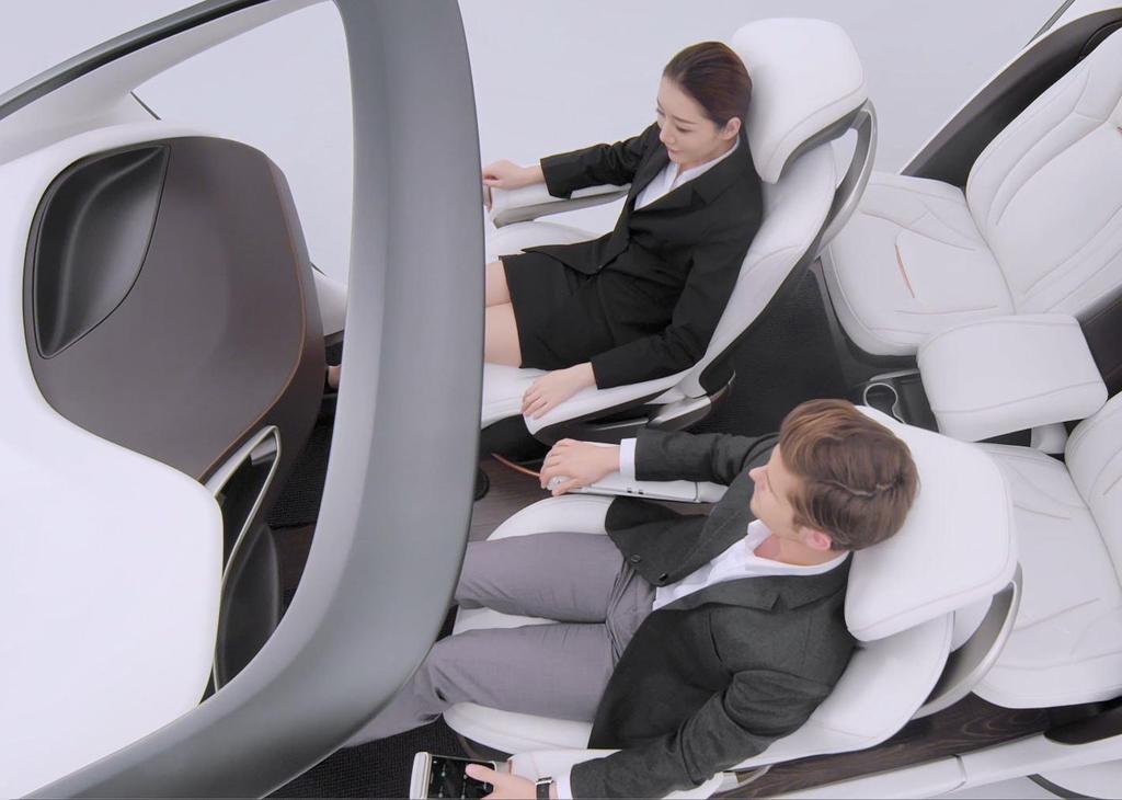 The front seats swing-in to allow easier
