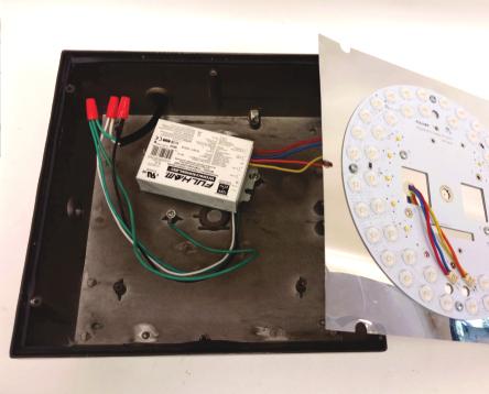 Place the LED Module onto the original luminaire plate and center it as shown in ﬁgure 8. Figure 7 Figure 8 Figure 9 Figure 10 5.