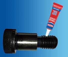 c) Apply the supplied Loctite Threadlocker Blue 242 to the shoulder bolt by following these steps and referring to Figure 9: To prevent Loctite Threadlocker Blue 242 from clogging in the nozzle,