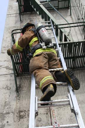 LOCKING INTO A LADDER Firefighters must be secured to the ladder when working from heights. The Department utilizes the leg lock to accomplish this. 1.