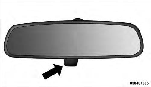 MIRRORS Inside Day/Night Mirror Headlight glare can be reduced by moving the small control under the mirror to the night position (toward the rear of the vehicle).