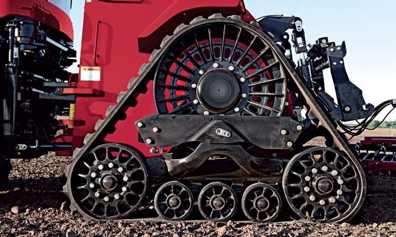 Quadtrac lugs interlock with bars on the drive wheel, eliminating slippage between the drive wheel and track. Positive drive delivers continuous power at all times, even in a wet or slippery spot.