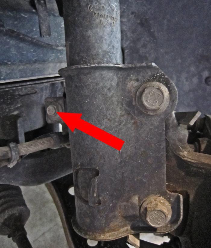 7. Remove the bolt from the Brake Line bracket using a 10mm socket.