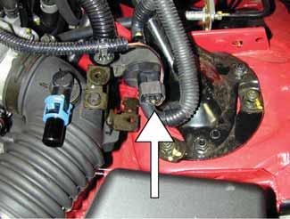 Make sure vehicle is parked on level surface. b. Set parking brake. c. If engine has run in the past two hours, let it cool down. d. Disconnect negative battery terminal. e. Raise the front of the vehicle with a jack.