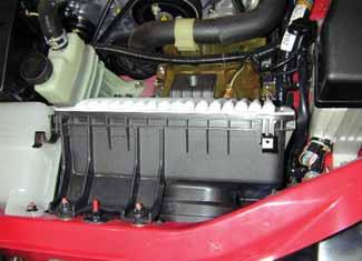 e. Unscrew the inlet tube from the throttle body and the air