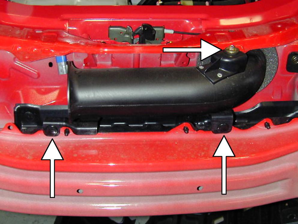 Disconnect and unhook the wiring harness from the horn attached to the