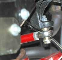 Insert the bushing end into the OEM steering stabilizer location on the passenger side of the axle, not the OEM track bar location.